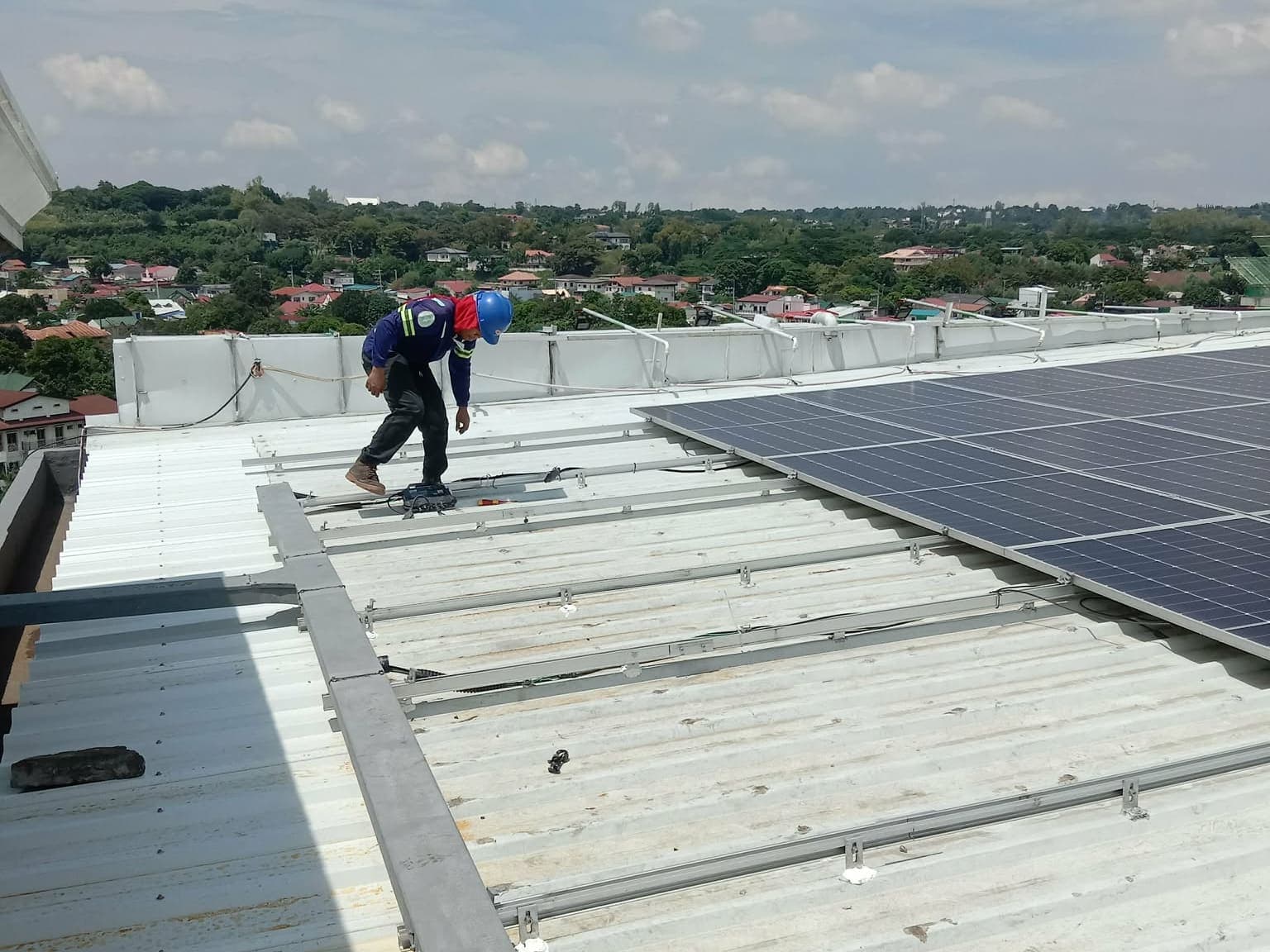 Healthcare facility · Biñan, Laguna · 103.24 kWp — site photography