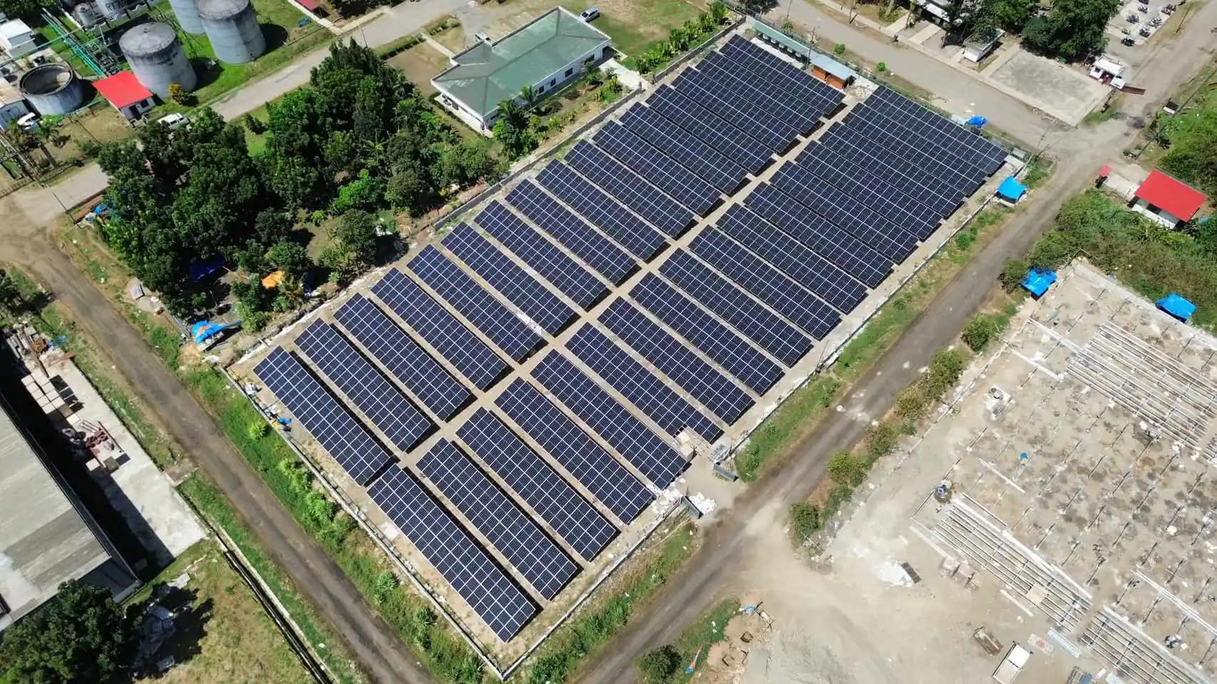Aerial drone view of a large ground-mount solar array in Negros Occidental